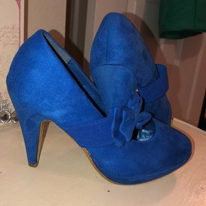 Blue suede bow heels